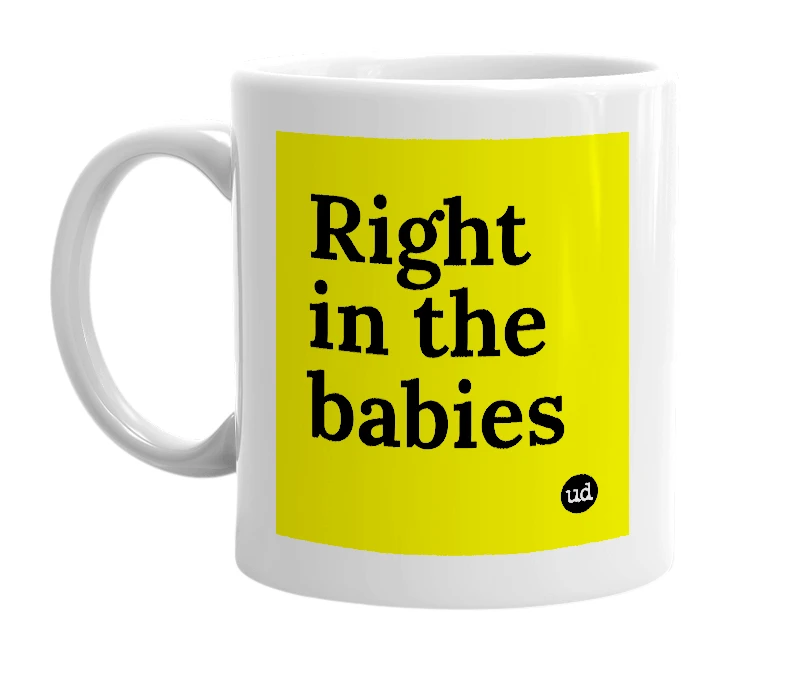 White mug with 'Right in the babies' in bold black letters