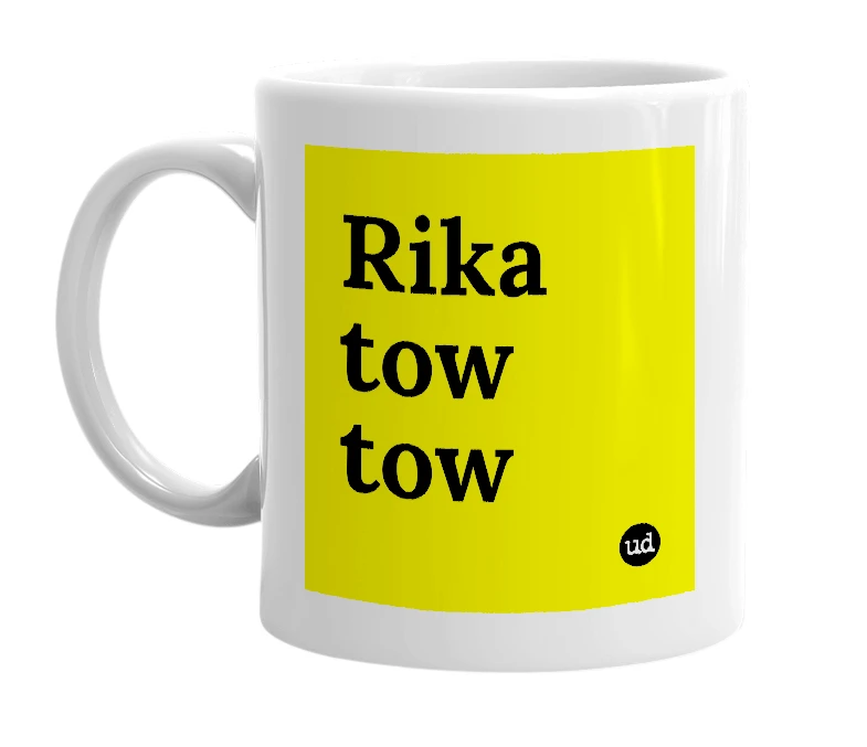 White mug with 'Rika tow tow' in bold black letters