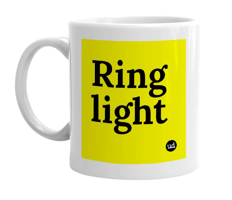 White mug with 'Ring light' in bold black letters