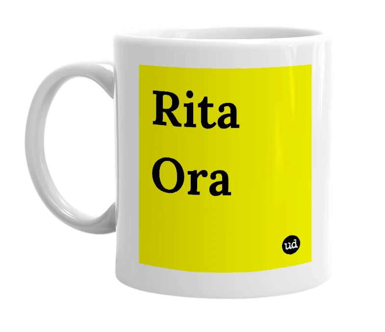 White mug with 'Rita Ora' in bold black letters