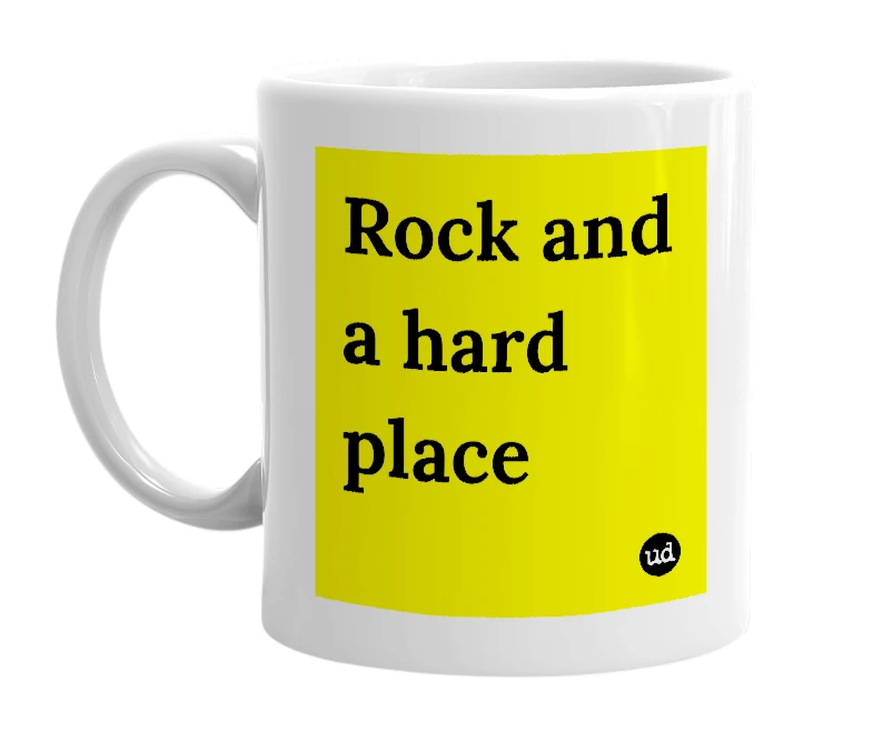 White mug with 'Rock and a hard place' in bold black letters