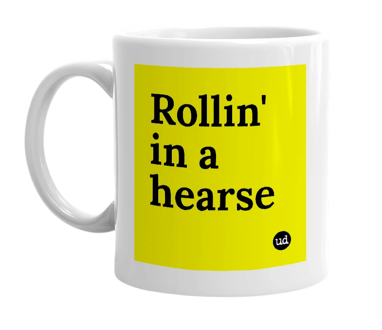 White mug with 'Rollin' in a hearse' in bold black letters