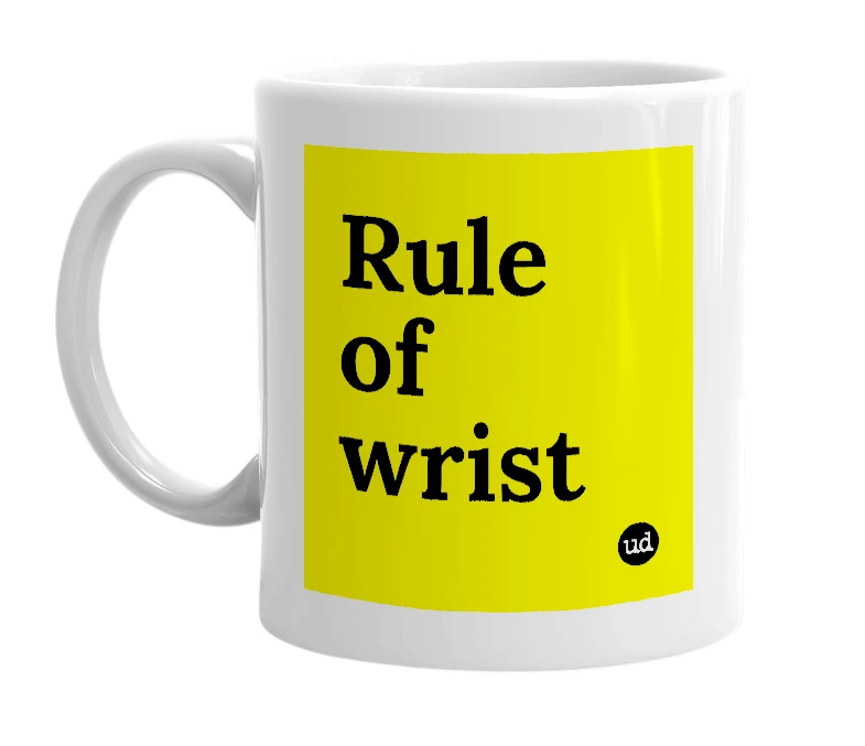 White mug with 'Rule of wrist' in bold black letters