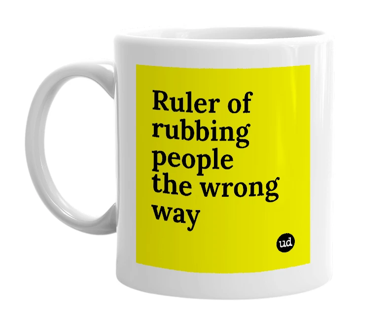 White mug with 'Ruler of rubbing people the wrong way' in bold black letters