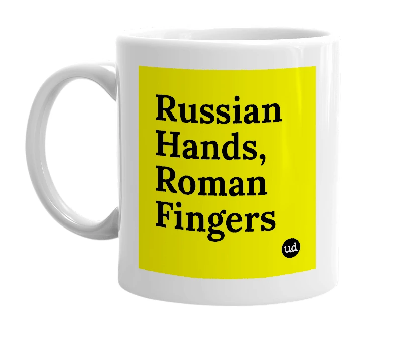 White mug with 'Russian Hands, Roman Fingers' in bold black letters