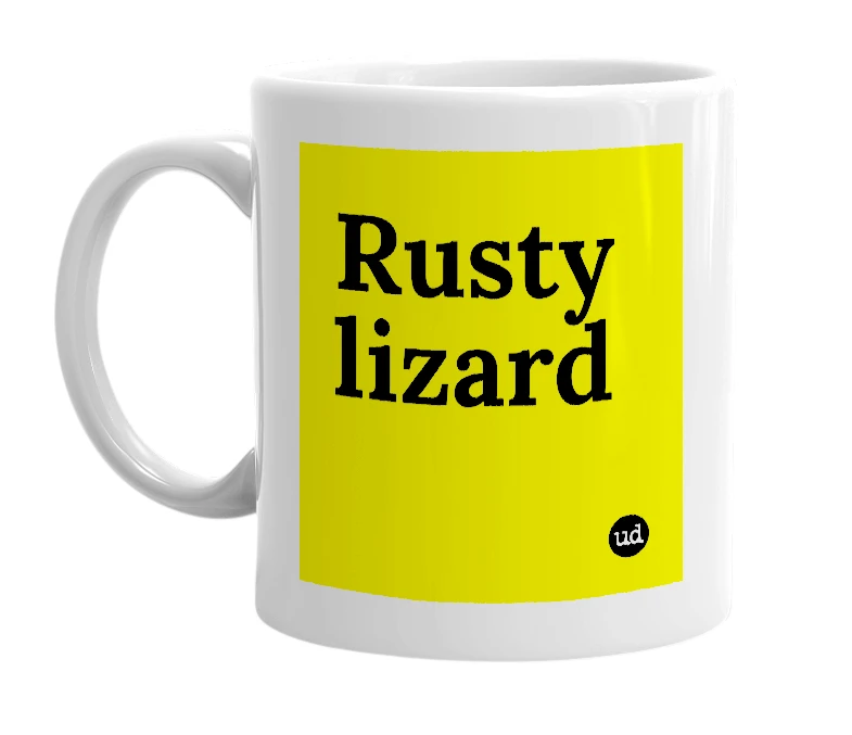 White mug with 'Rusty lizard' in bold black letters