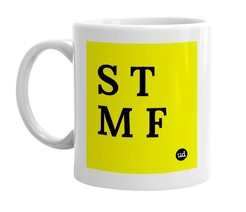 White mug with 'S T M F' in bold black letters