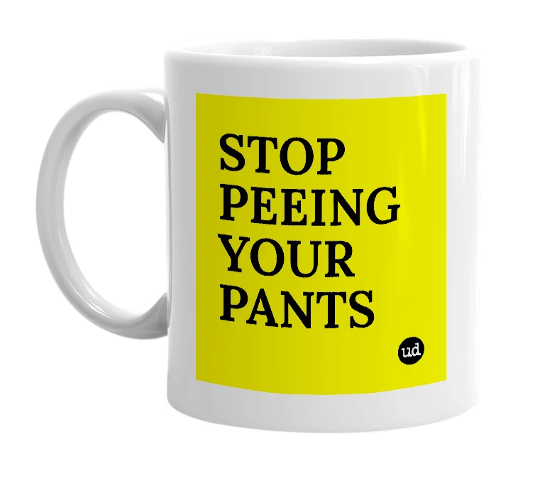 White mug with 'STOP PEEING YOUR PANTS' in bold black letters