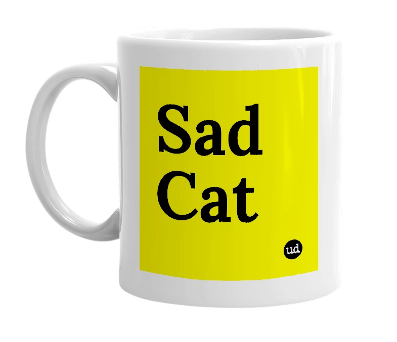 White mug with 'Sad Cat' in bold black letters