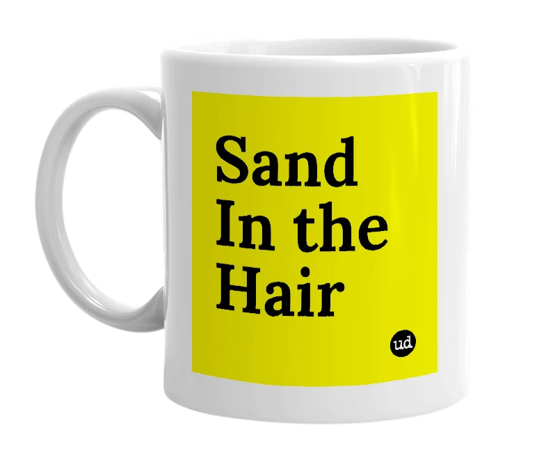 White mug with 'Sand In the Hair' in bold black letters