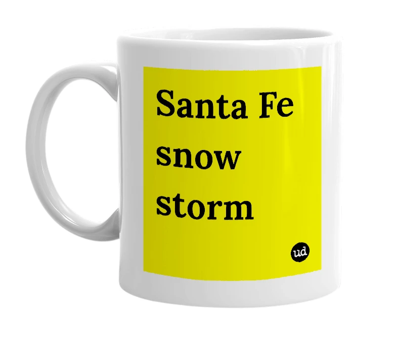 White mug with 'Santa Fe snow storm' in bold black letters