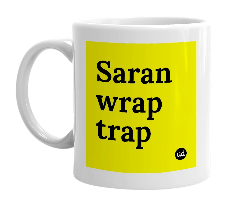 White mug with 'Saran wrap trap' in bold black letters