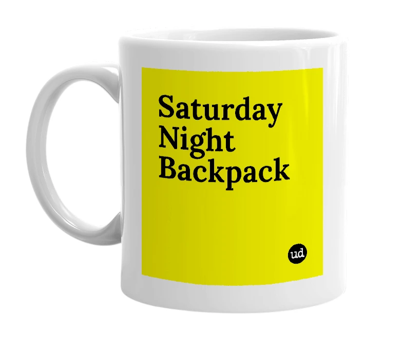 White mug with 'Saturday Night Backpack' in bold black letters