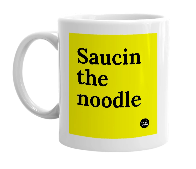 White mug with 'Saucin the noodle' in bold black letters