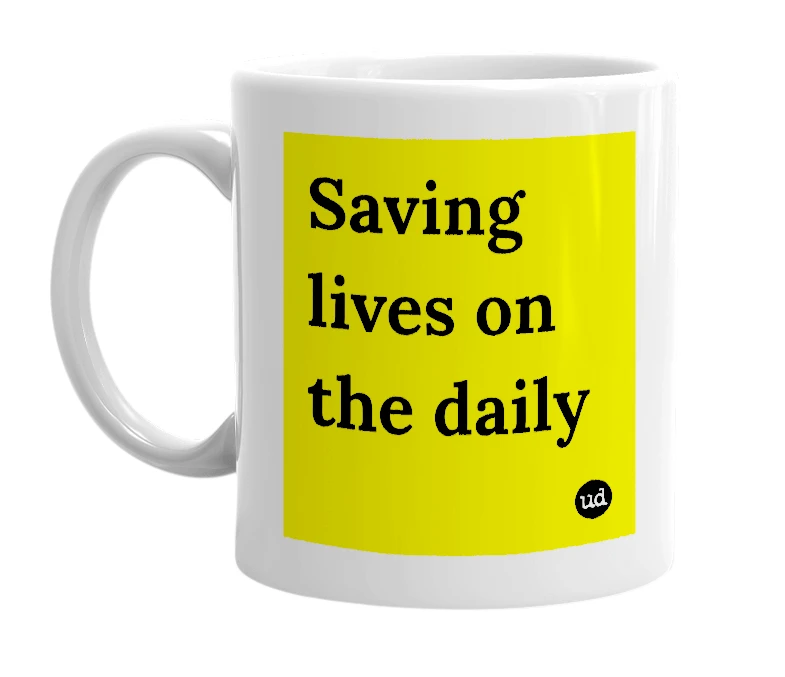 White mug with 'Saving lives on the daily' in bold black letters