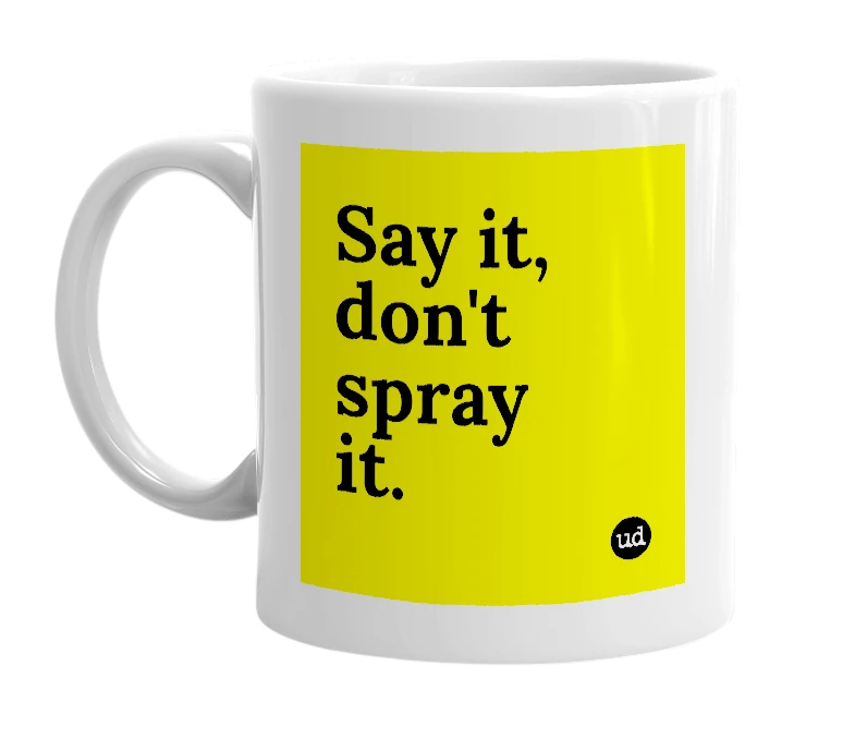 White mug with 'Say it, don't spray it.' in bold black letters