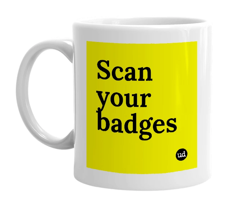 White mug with 'Scan your badges' in bold black letters