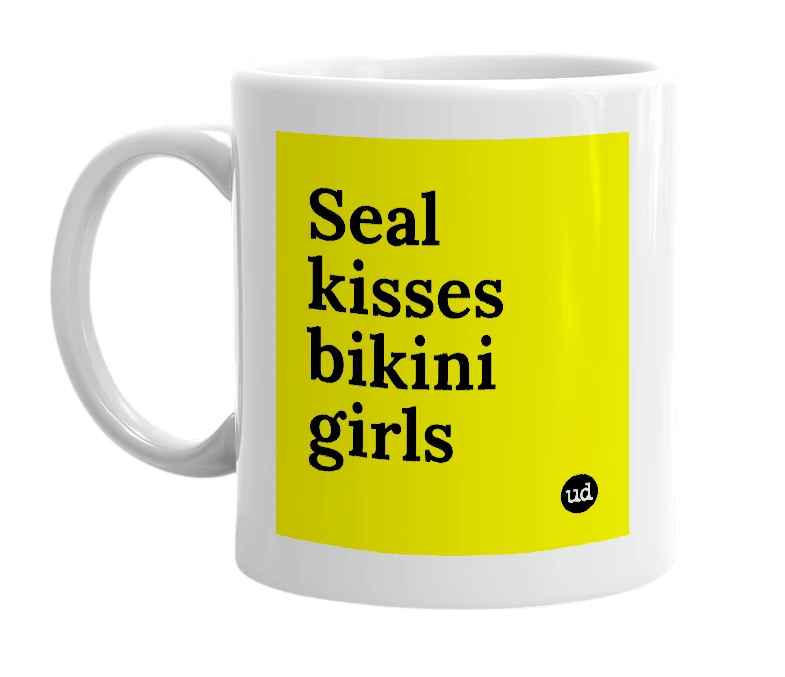 White mug with 'Seal kisses bikini girls' in bold black letters