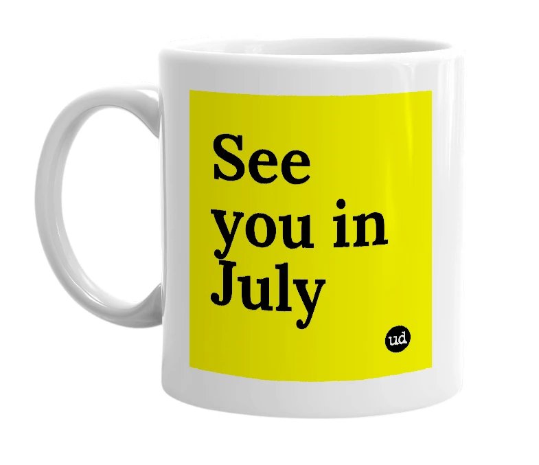 White mug with 'See you in July' in bold black letters