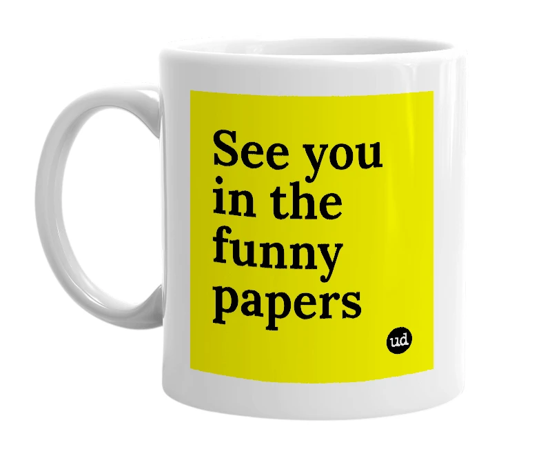 White mug with 'See you in the funny papers' in bold black letters