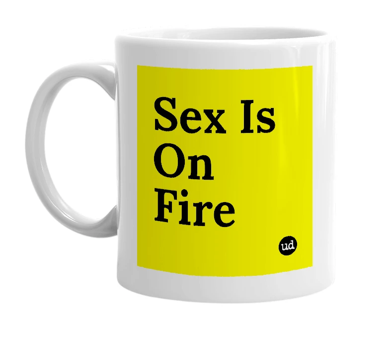 White mug with 'Sex Is On Fire' in bold black letters