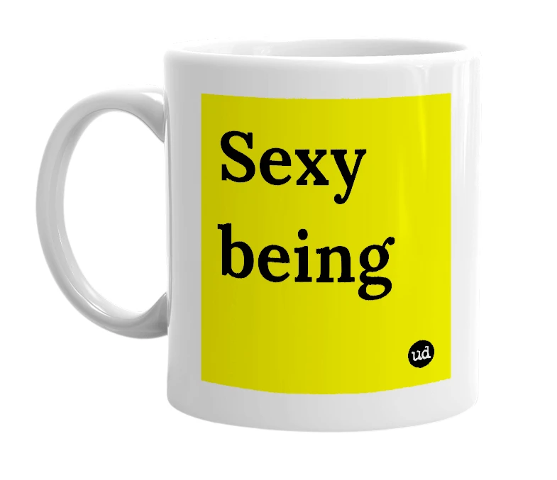 White mug with 'Sexy being' in bold black letters