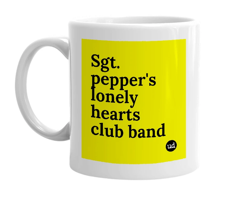 White mug with 'Sgt. pepper's lonely hearts club band' in bold black letters