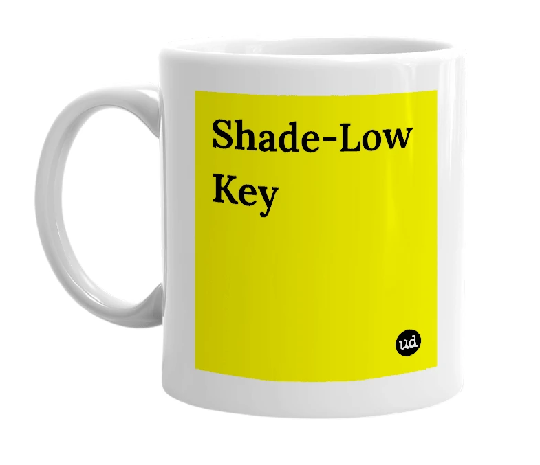 White mug with 'Shade-Low Key' in bold black letters