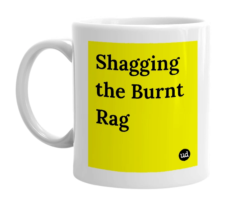White mug with 'Shagging the Burnt Rag' in bold black letters