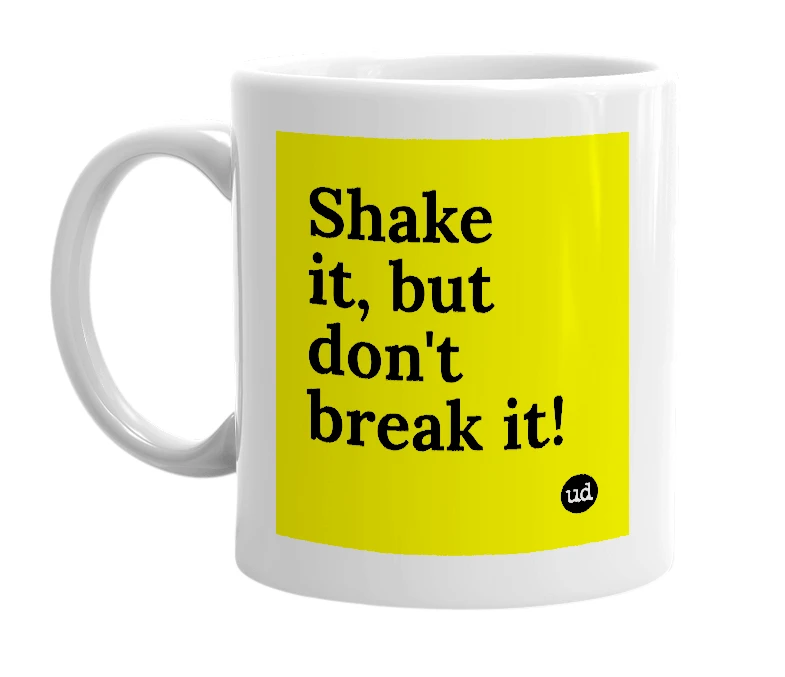 White mug with 'Shake it, but don't break it!' in bold black letters