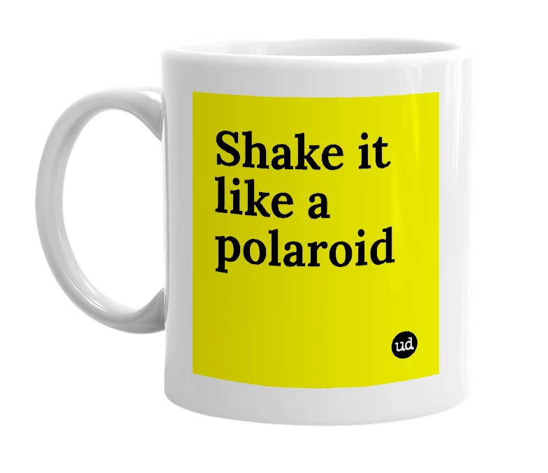 White mug with 'Shake it like a polaroid' in bold black letters