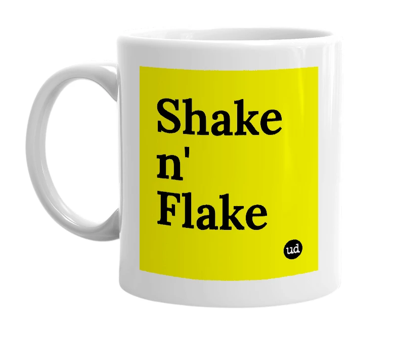 White mug with 'Shake n' Flake' in bold black letters