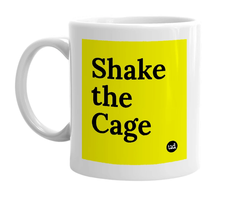 White mug with 'Shake the Cage' in bold black letters