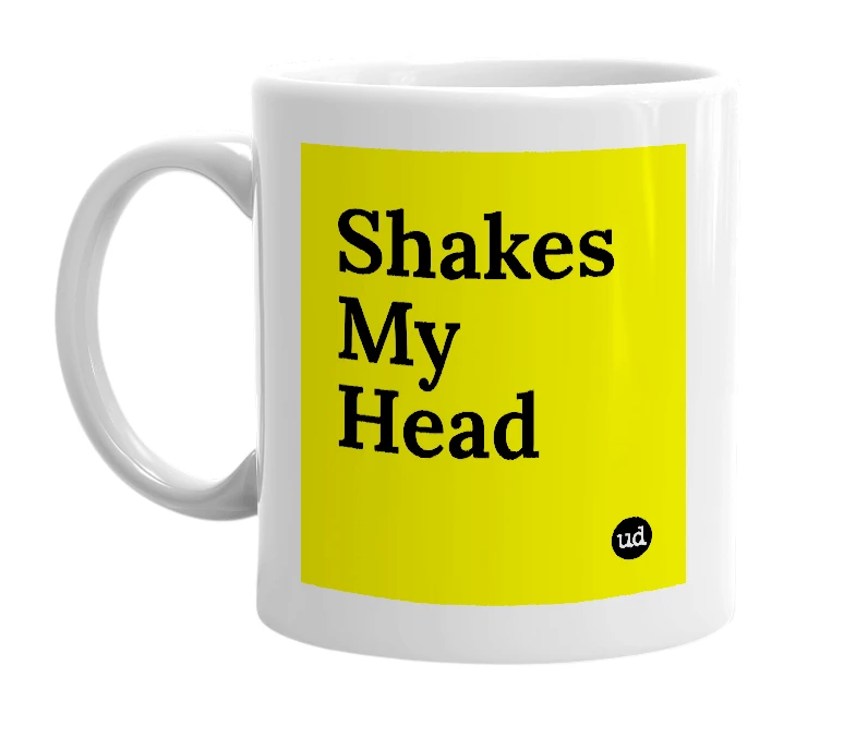 White mug with 'Shakes My Head' in bold black letters