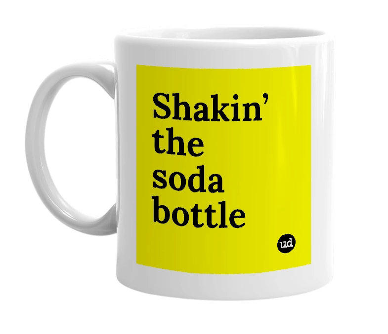 White mug with 'Shakin’ the soda bottle' in bold black letters