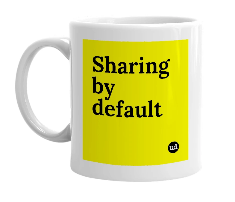White mug with 'Sharing by default' in bold black letters