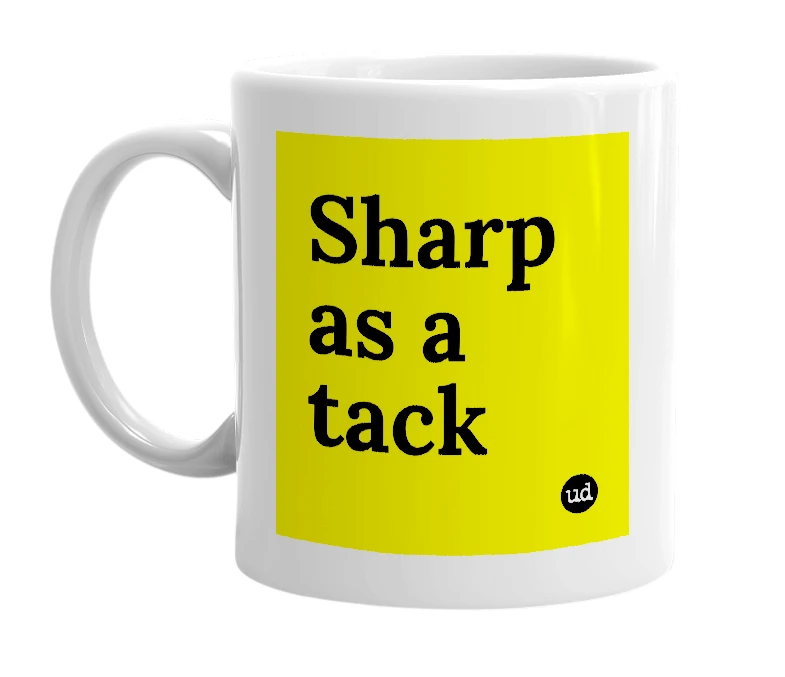 White mug with 'Sharp as a tack' in bold black letters