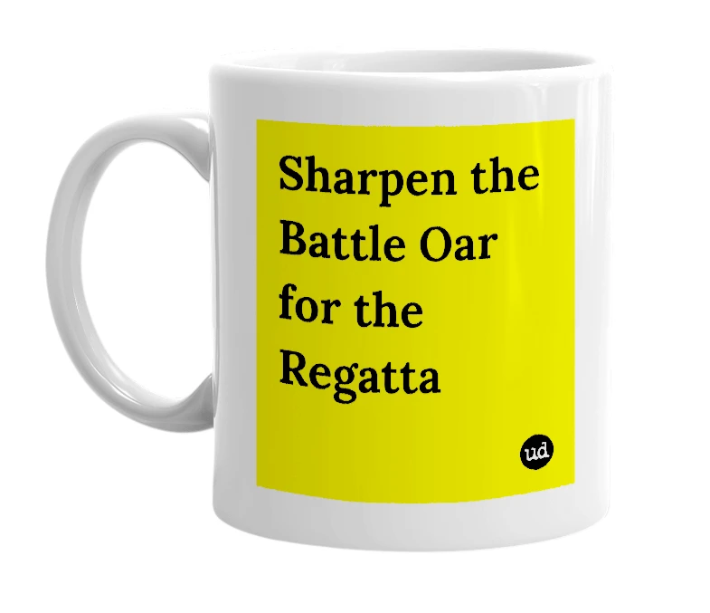 White mug with 'Sharpen the Battle Oar for the Regatta' in bold black letters