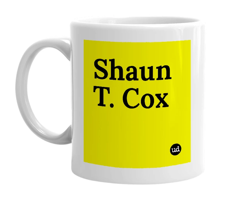 White mug with 'Shaun T. Cox' in bold black letters