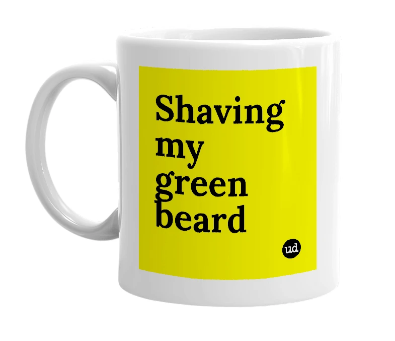 White mug with 'Shaving my green beard' in bold black letters