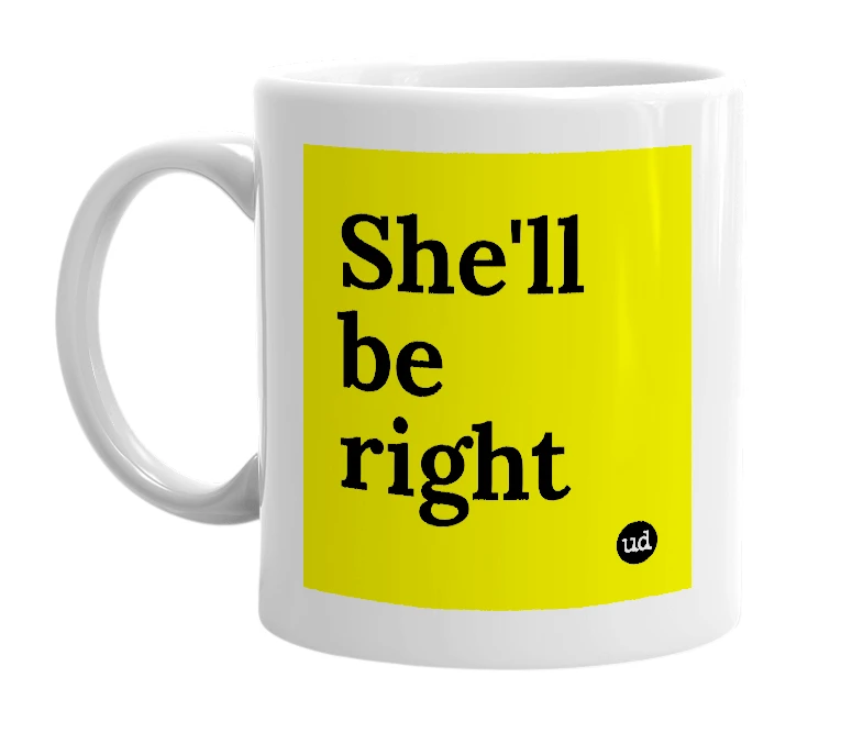 White mug with 'She'll be right' in bold black letters