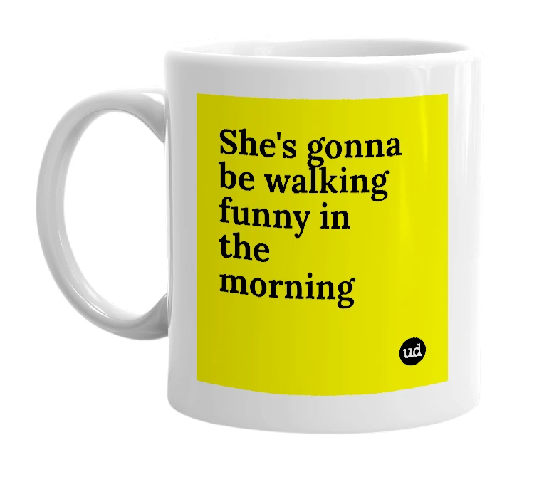 White mug with 'She's gonna be walking funny in the morning' in bold black letters