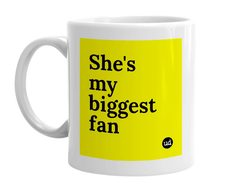 White mug with 'She's my biggest fan' in bold black letters