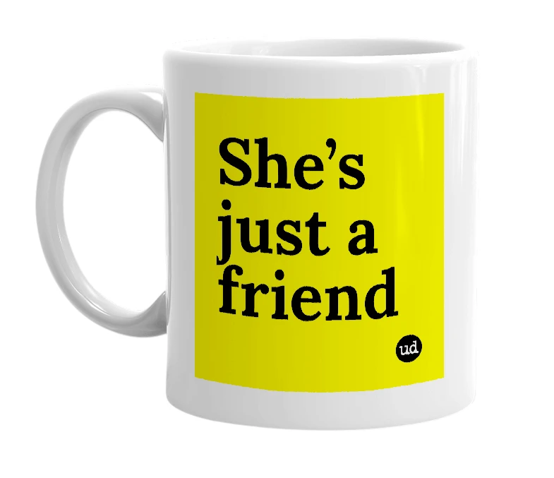 White mug with 'She’s just a friend' in bold black letters