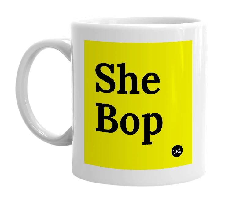 White mug with 'She Bop' in bold black letters