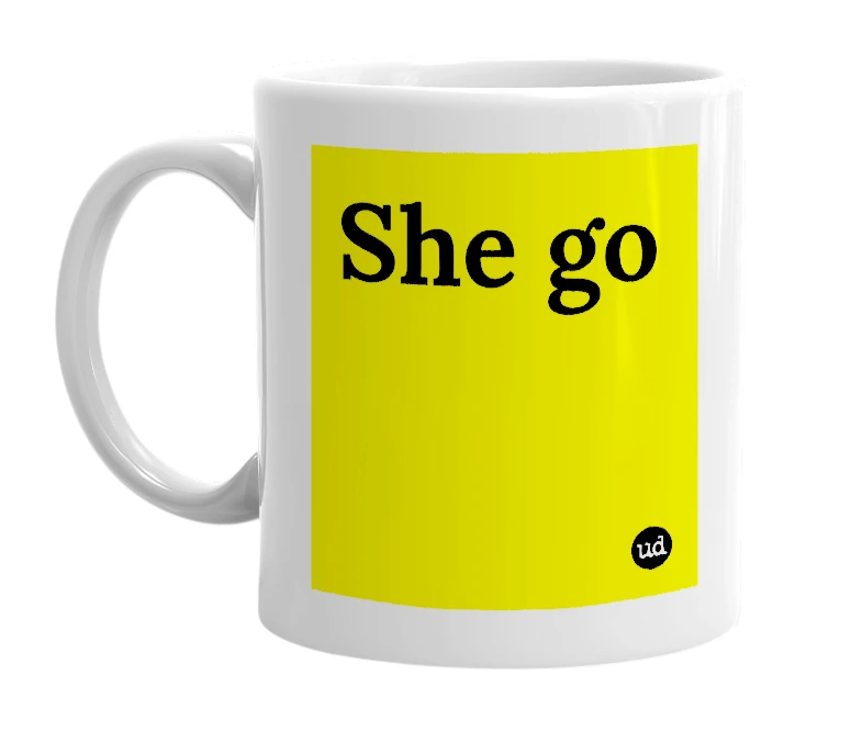 White mug with 'She go' in bold black letters