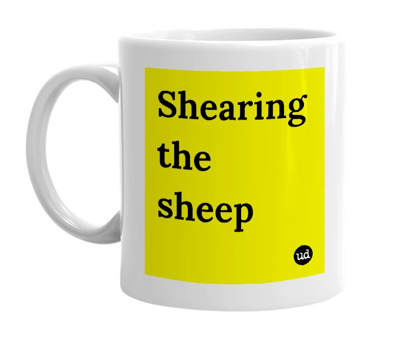White mug with 'Shearing the sheep' in bold black letters