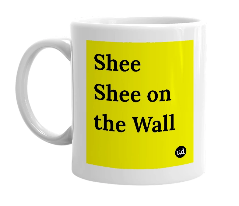 White mug with 'Shee Shee on the Wall' in bold black letters
