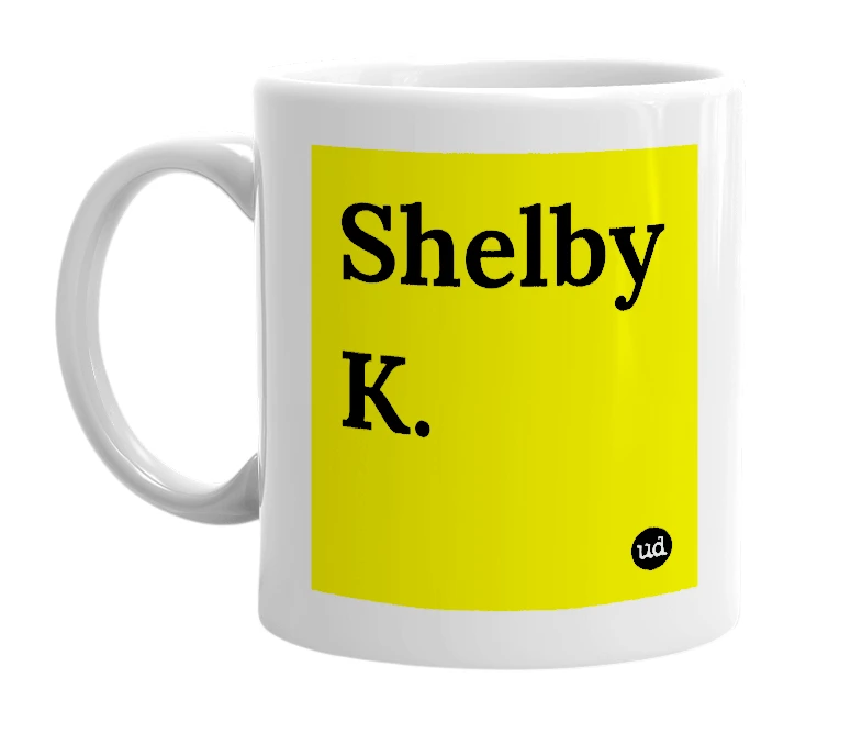 White mug with 'Shelby K.' in bold black letters