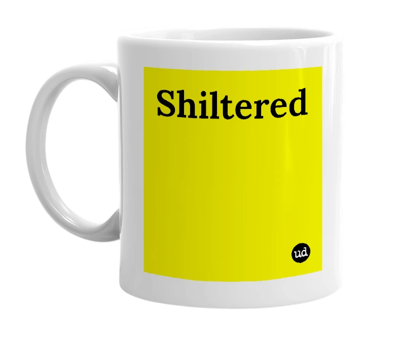 White mug with 'Shiltered' in bold black letters